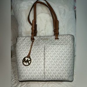 Michael Kors monogram handbag. Well used but still in great condition.